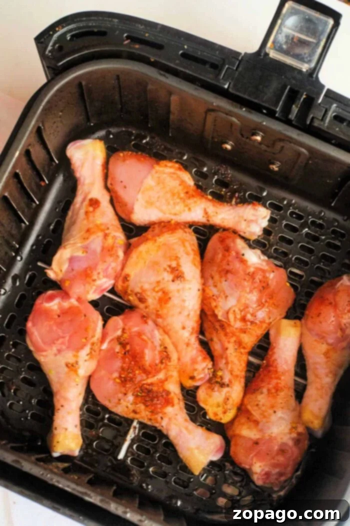 Guide on how to air fry raw chicken safely and deliciously.