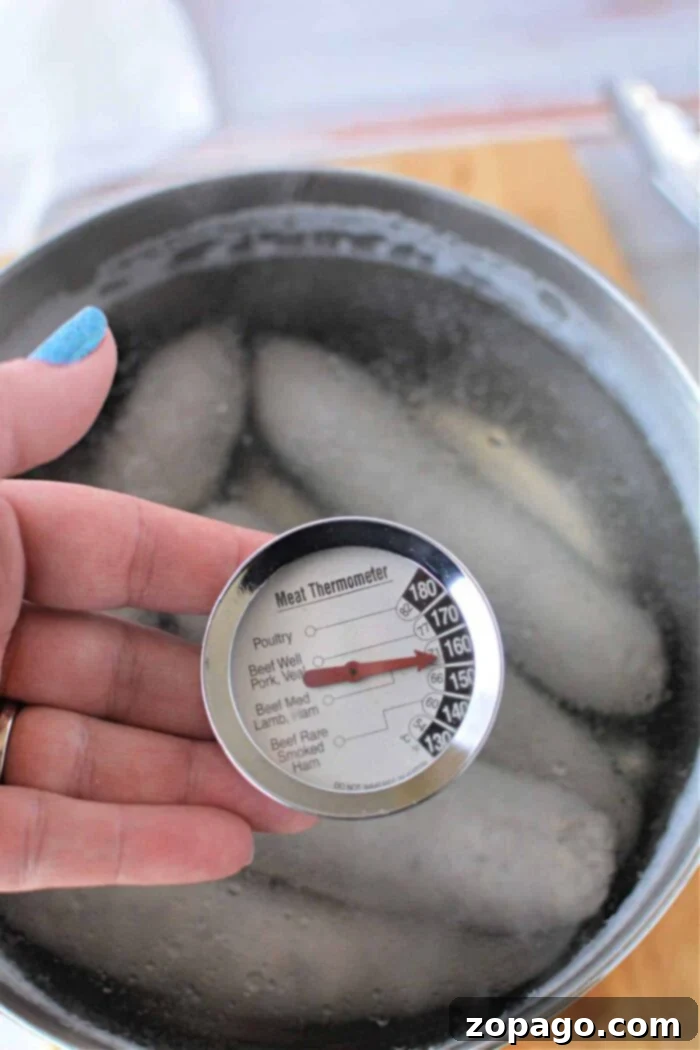 The Perfect Boil Time for Brats 5 Freshly boiled brats in beer, glistening and ready for serving or grilling.