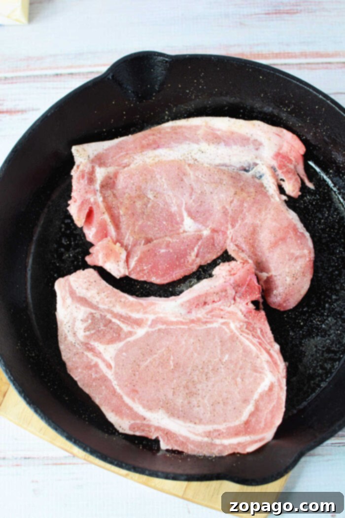 Juicy Pork Chops with Velvety Mushroom Gravy 5 Bone-in pork chops generously covered in a rich, homemade mushroom gravy.