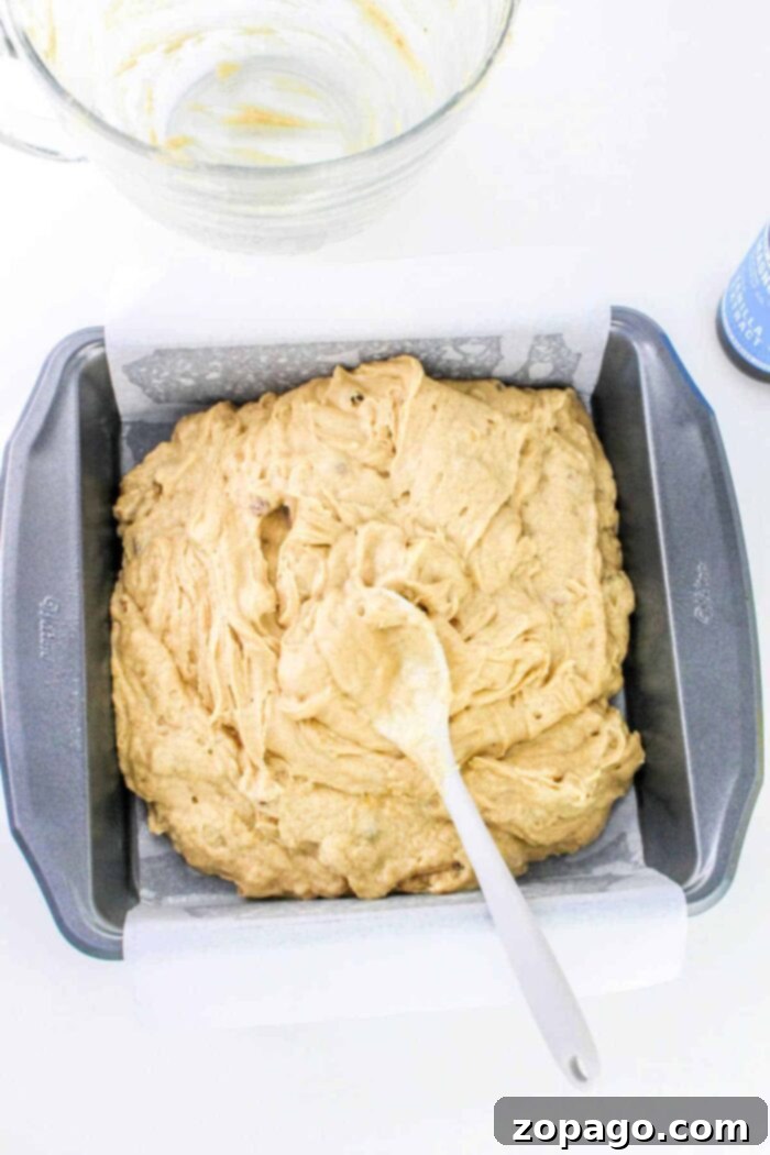 Banana Snack Cake A Simple Pleasure 5 Detailed shot showing the process of making a cake with bananas, including ingredients and a baking pan.