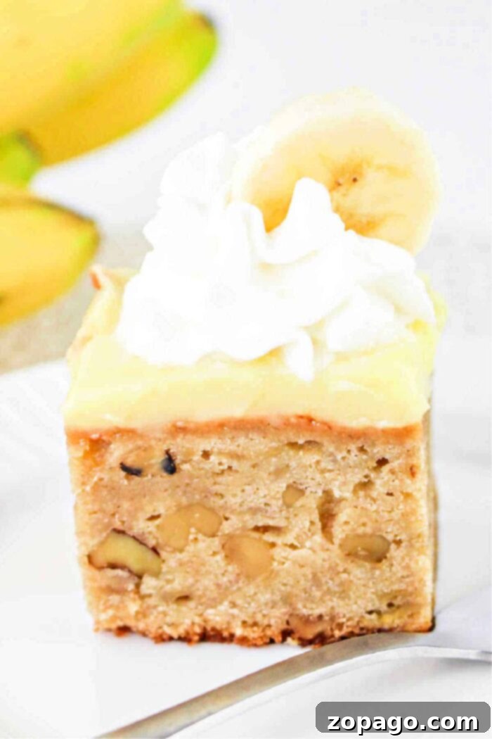 Banana Snack Cake A Simple Pleasure 7 A delectable One-Layer Banana Cream Cake, beautifully presented and ready to be enjoyed.