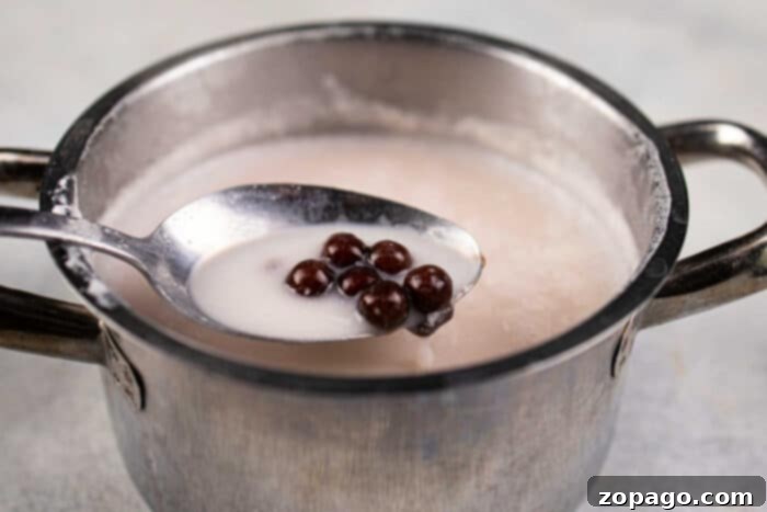 Perfect Homemade Boba for Bubble Tea 6 Close-up of freshly boiled tapioca pearls, glistening and ready to be added to bubble tea