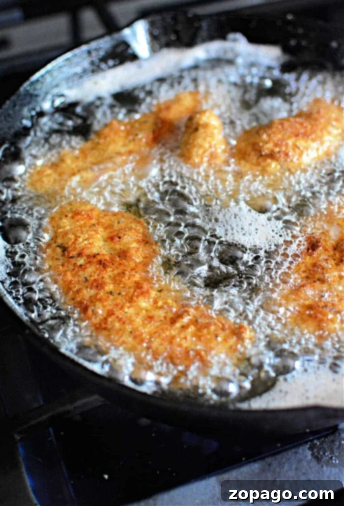 Crispy Chicken Tender Basket 6 Deep fried chicken and fries being served