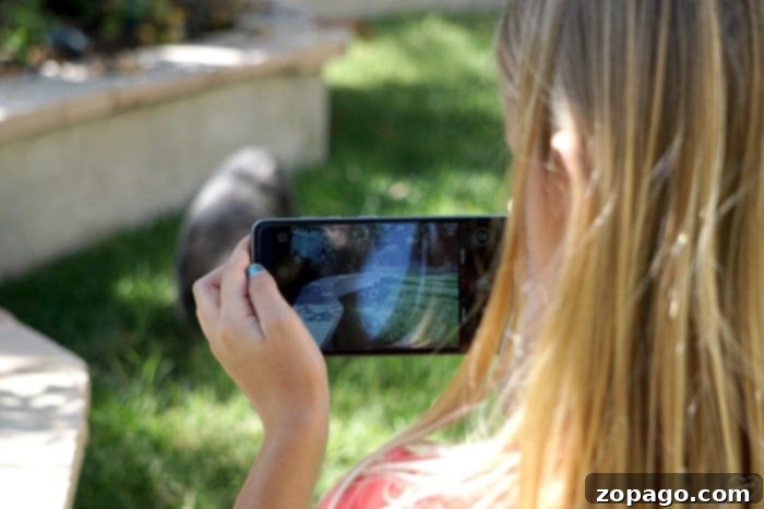 Choosing the Perfect First Phone for Your Tween 2 Young person happy with their first cell phone