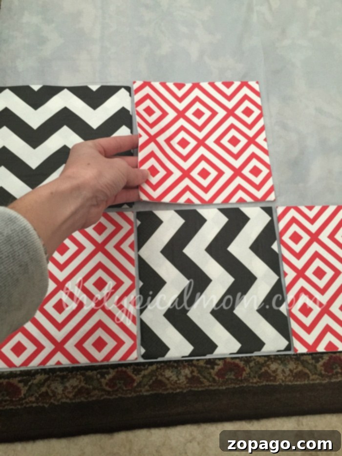 DIY Checkerboard Layout: Setting Up Your Game Board Arranging napkins on a tablecloth to form a DIY checkerboard layout.