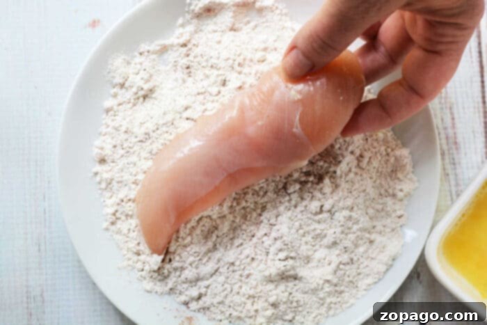 Crispy Golden Fried Chicken Tenders 3 how to get breading to stick to chicken