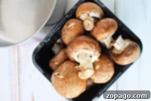 Best way to clean and prepare baby bella mushrooms for slow cooking.