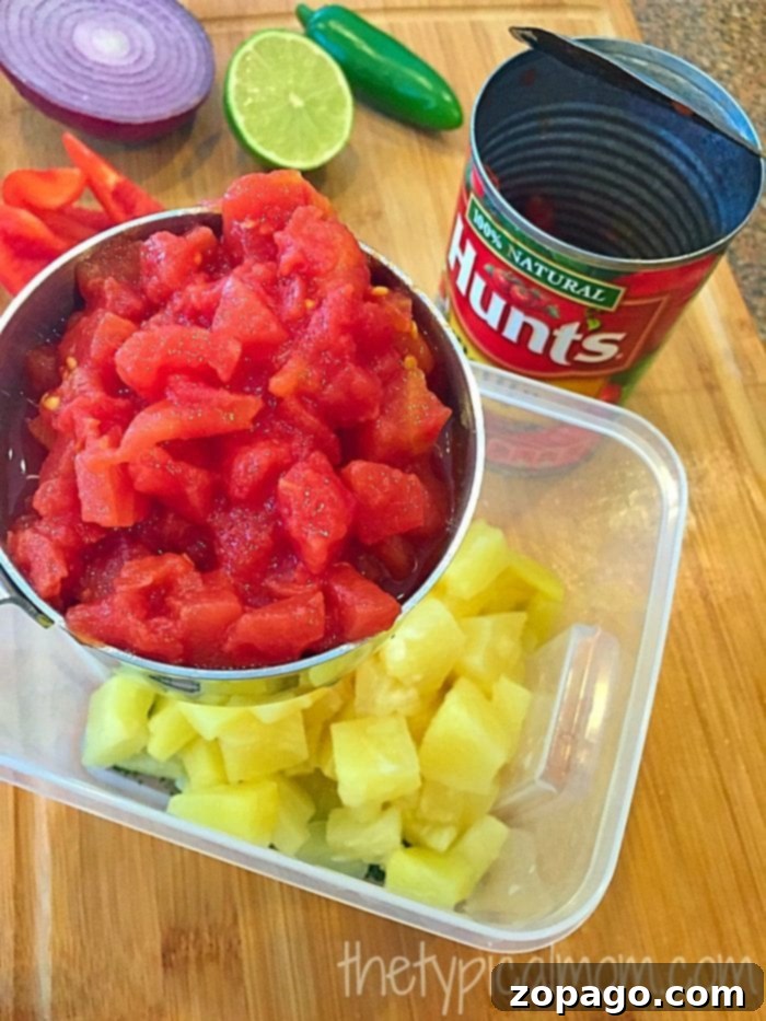 Quick and easy pineapple salsa preparation. Freshly diced ingredients for pineapple salsa, ready to be mixed.