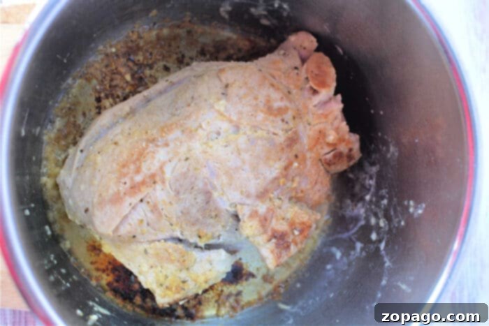 Perfectly Roasted Pork Sirloin 4 Savor the succulent flavors of a perfectly cooked pork sirloin roast, seasoned to perfection and simmered in its own savory juices.