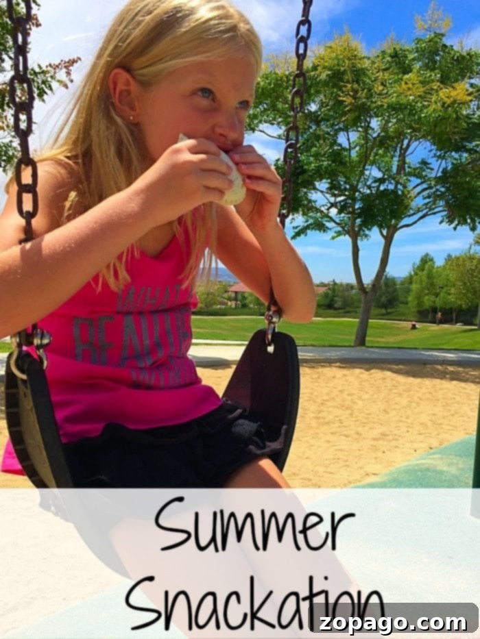 Summer Snackation: Staycation Goodies for Kids Smiling kids enjoying a summer snackation with a variety of easy snacks, perfect for a staycation