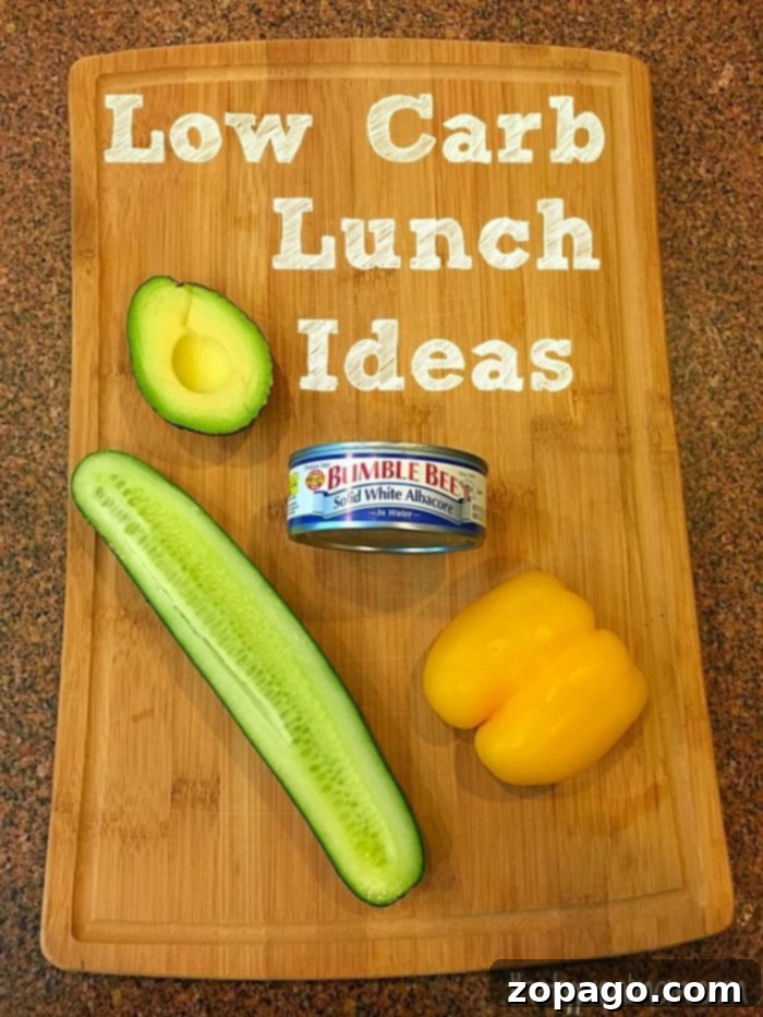 Low carb lunches that are easy to make, healthy, and high in protein while incorporating vegetables in them too. Simple healthy lunches! #lowcarb #lunch #recipes #tuna Easy Low Carb Lunch - Tuna Stuffed Avocado and Cucumber