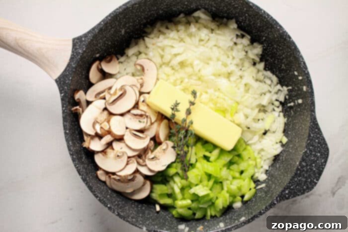 Classic Jiffy Cornbread Dressing 4 Chopped onions, celery, mushrooms, butter, and thyme in a skillet, perfect as a base for Jiffy Cornbread Stuffing.