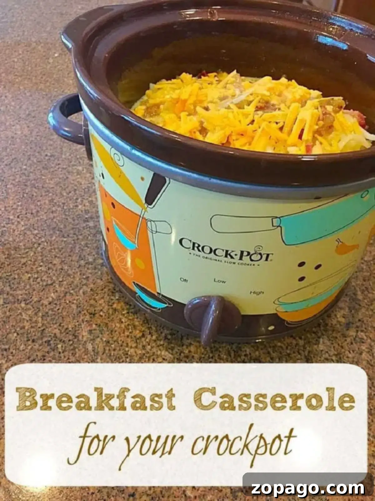 Easy crockpot breakfast casserole recipe is a hit with everyone, especially during the holidays. Perfect slow cooker breakfast that's layered with cheese, bacon and hashbrowns that makes for a hearty brunch and is great on Christmas morning too. How else would you load it up? A Crock-Pot filled with a mouthwatering slow cooker breakfast casserole, topped with shredded cheese. Text overlay: Breakfast Casserole for your crockpot.