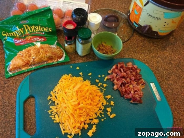 Crockpot breakfast casserole recipe is a hit with everyone, especially during the holidays. Perfect slow cooker breakfast that's layered with cheese, bacon and hashbrowns that makes for a hearty brunch and is great on Christmas morning breakfast too. Easy breakfast crockpot recipe, showing a serving of casserole with a spoon, garnished with fresh herbs.