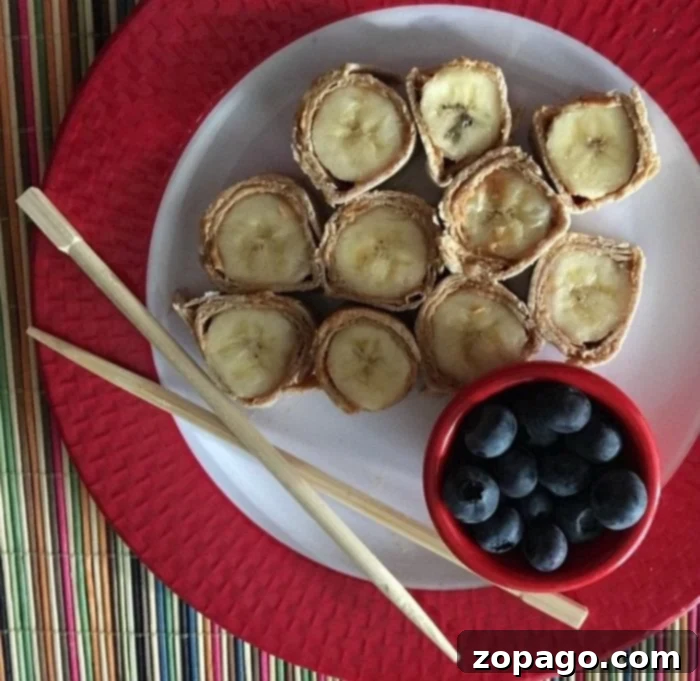 Peanut Butter Sushi Sandwich Creative peanut butter and fruit sushi sandwich rolls, a fun and healthy snack for kids.