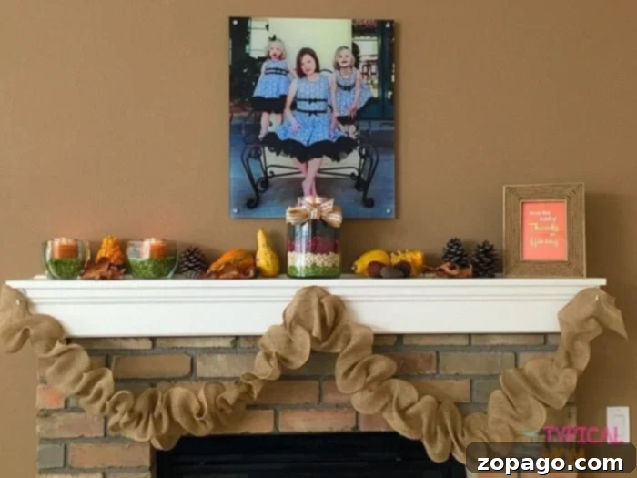 Rustic Fall Mantel Decor with Burlap Garland Close-up of a rustic Fall mantel display featuring a DIY burlap garland, pumpkins, and candles.