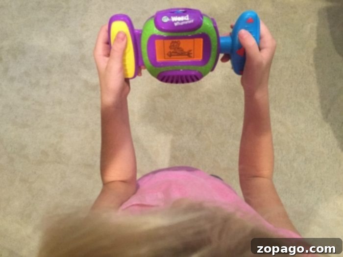 LeapFrog Word Whammer Spelling Quest 2 LeapFrog Word Whammer in action, showing a child engaged in spelling practice.