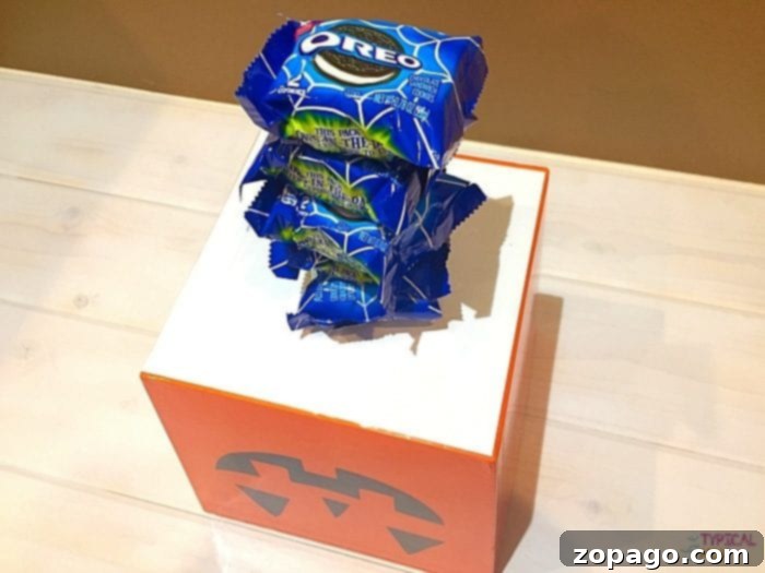 Easy and Fun Halloween Games Kids enjoying a simple Halloween game with OREO cookie towers