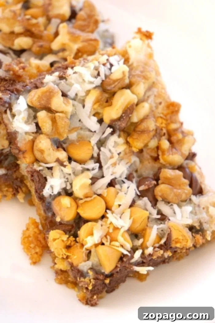 Better Than Sex Cookie Bar Recipe: A heavenly 5-layer dessert with chocolate chips, nuts, and coconut, ideal for any occasion. Irresistible Better Than Sex Cookie Bars with five delectable layers, chocolate chips, nuts, and coconut. Perfect for holidays and potlucks.
