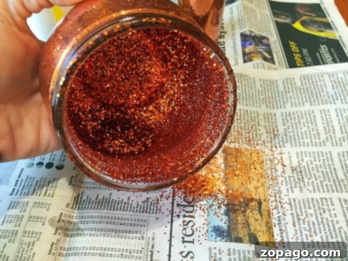 Budget-Friendly Thanksgiving DIYs 7 Thanksgiving Craft for Kids: Adding Glitter to Glass Jar
