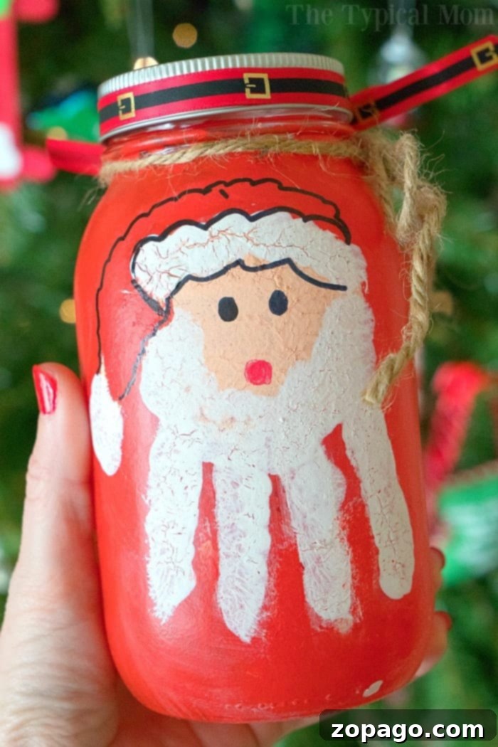 Mason Jar Crafting Unleashed 2 Santa Handprint Craft on a mason jar