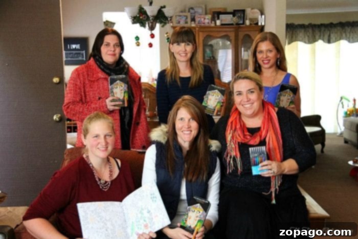 Uncork Creativity Your Guide to a Stellar Color and Sip Party 8 A close-up view of a partially colored intricate design in an adult coloring book, surrounded by hands holding colored pencils and a glass of bubbly, epitomizing a relaxing sip and color party with friends.