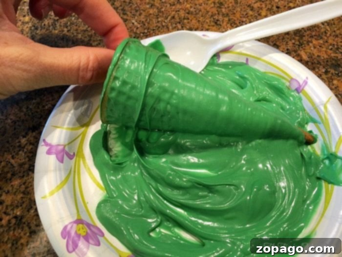 Gather your ingredients for this fun and easy Christmas cupcake decorating activity. Ingredients laid out for Christmas Tree Cupcakes crafting