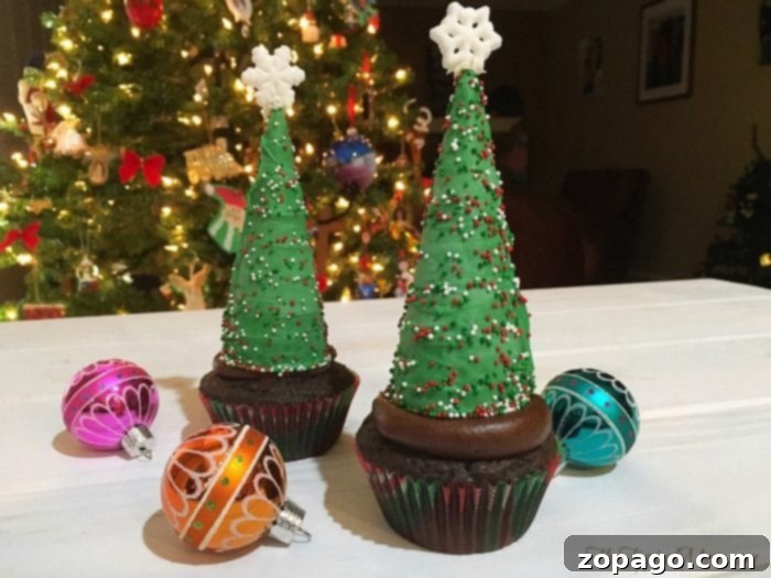 Your very own forest of festive Christmas Tree Cupcakes, ready to bring joy to any holiday gathering. A tray of beautifully decorated Christmas Tree Cupcakes ready for serving
