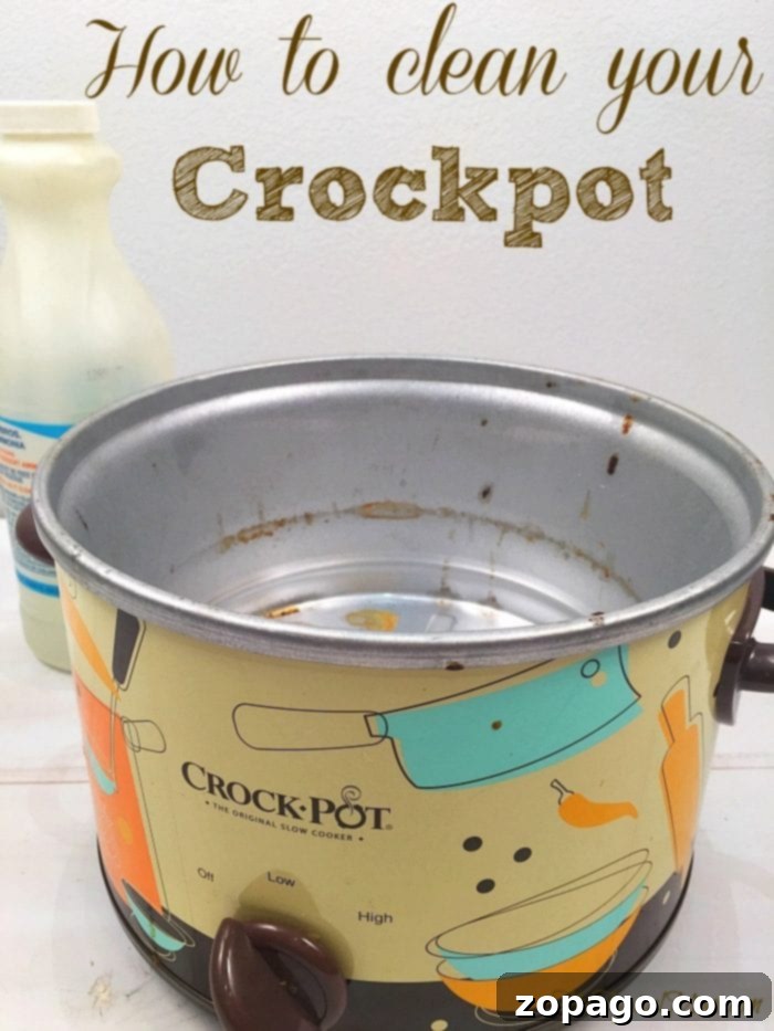 How to clean your crockpot, the inside of your crockpot, with just a few household items! If you haven't done this before it's probably disgusting! #crockpot #cleaning #house #slowcooker how to clean your crockpot - showing the initial state of the dirty slow cooker base