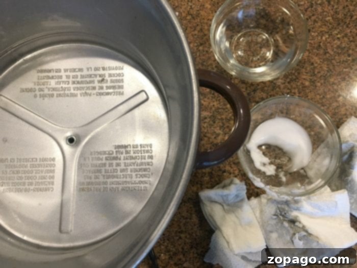 How to clean your crockpot, the inside of your crockpot, with just a few household items! If you haven't done this before it's probably disgusting! #crockpot #cleaning #house #slowcooker How to clean the inside of your crockpot - after cleaning, sparkling clean