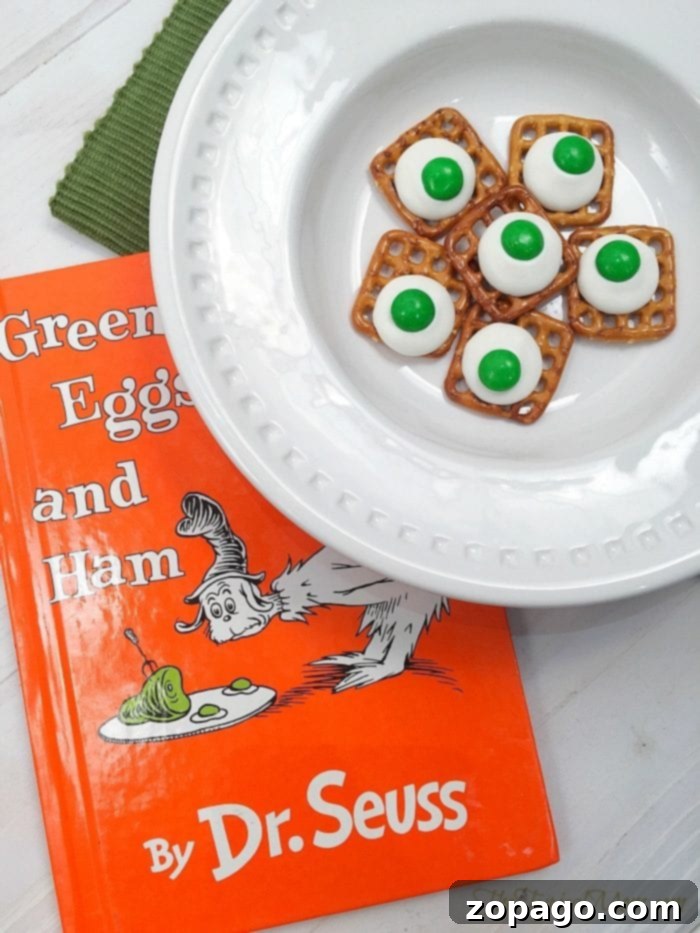 Easy Green Eggs and Ham Treats for a Dr. Seuss Party Green Eggs and Ham treats arranged on a tray, perfect for a Dr. Seuss celebration.