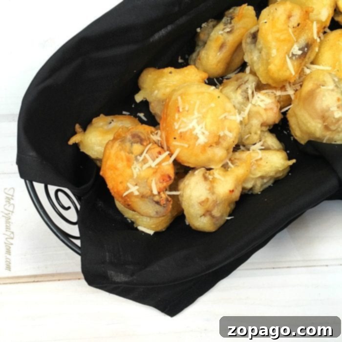 Golden Crispy Tempura Mushrooms 6 Close-up of golden brown tempura portobello mushrooms