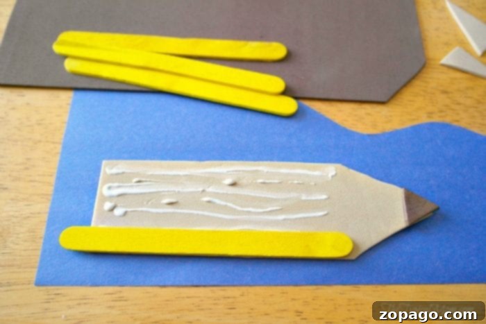 Crafty Popsicle Stick Fridge Magnets 4 glueing popsicle sticks to foam