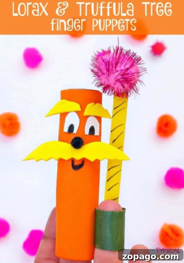 How to Make Dr. Seuss Truffula Tree Finger Puppets with Pom Poms and Popsicle Sticks Completed DIY Dr. Seuss Truffula Tree finger puppet with a pink pom pom top and striped yellow stick trunk.
