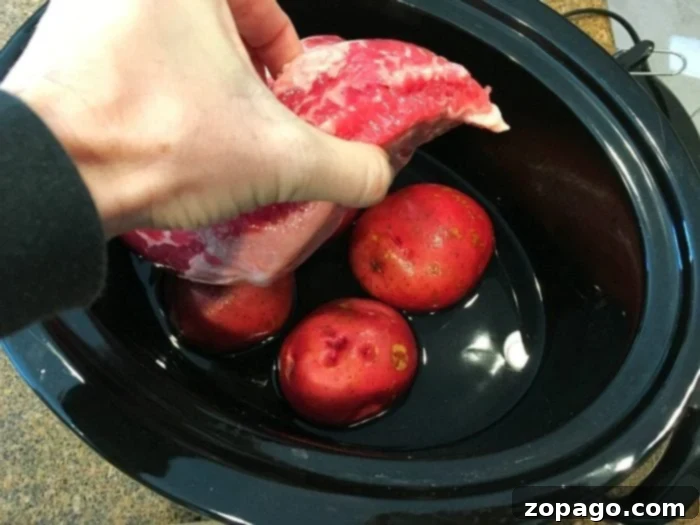 Ultimate Slow Cooker Corned Beef Brisket 5 Corned beef and cabbage in a slow cooker