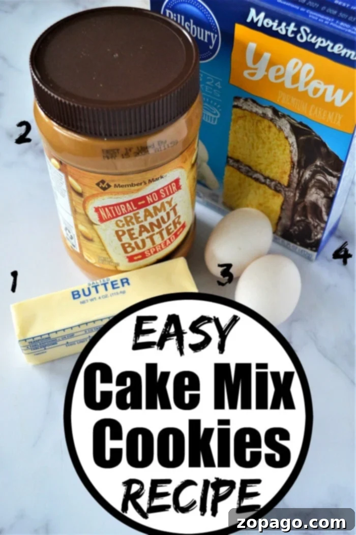 Effortless Cake Mix Cookies 3 A close-up shot of soft and chewy peanut butter cake mix cookies, showcasing their perfect golden-brown edges and the signature fork marks.