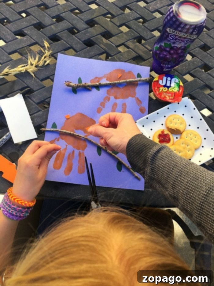 DIY handprint art ideas for kids Kids doing a handprint owl craft with sticks