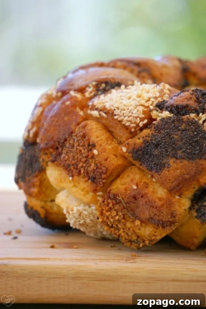 Savory monkey bread is the best along side pasta!! Super easy to make and looks beautiful as an appetizer or side dish or any occasion. #savory #monkeybread A top-down view of the savory monkey bread, beautifully arranged and ready to be served.