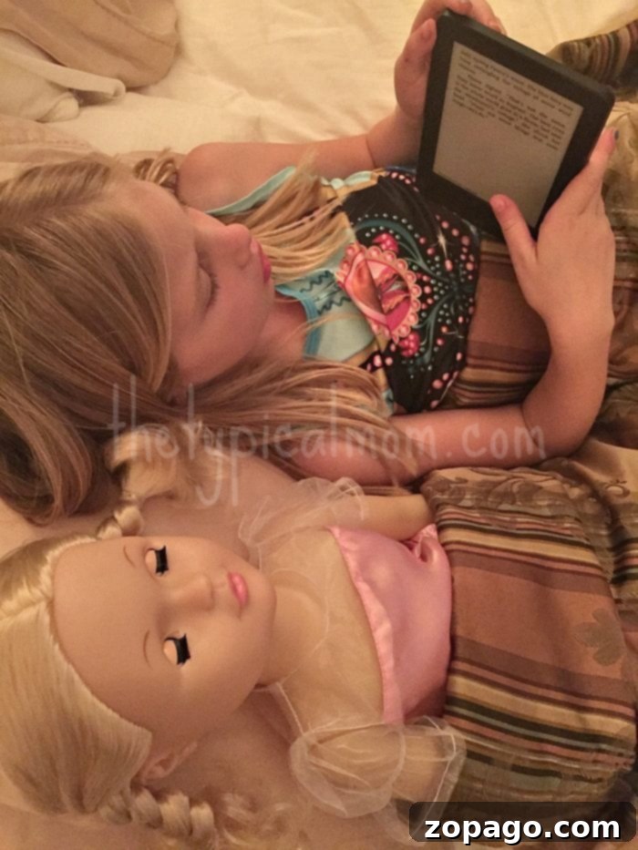 Kids Thrive on Routine 3 Parent reading with child using a Kindle, emphasizing consistent reading time as part of a daily routine.