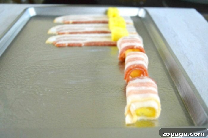 Pineapple Bacon Bliss 3 Delicious bacon-wrapped pineapple bites on a serving platter, an irresistible best bacon appetizer