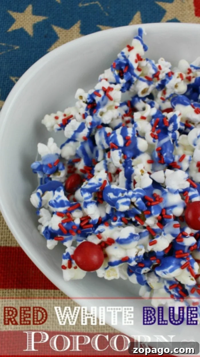 Red white and blue popcorn recipe is a perfect Memorial Day side dish or 4th of July dessert too. Chocolate popcorn with patriotic colors. fourth of July dessert