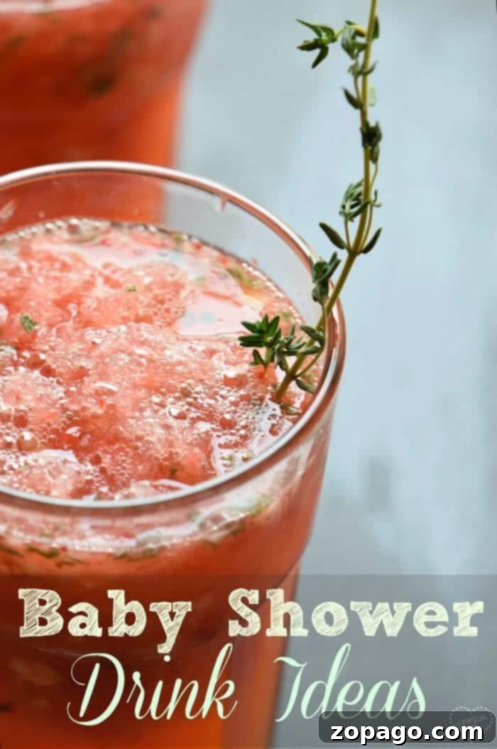 Variety of non-alcoholic baby shower drinks, including pink and blue options.