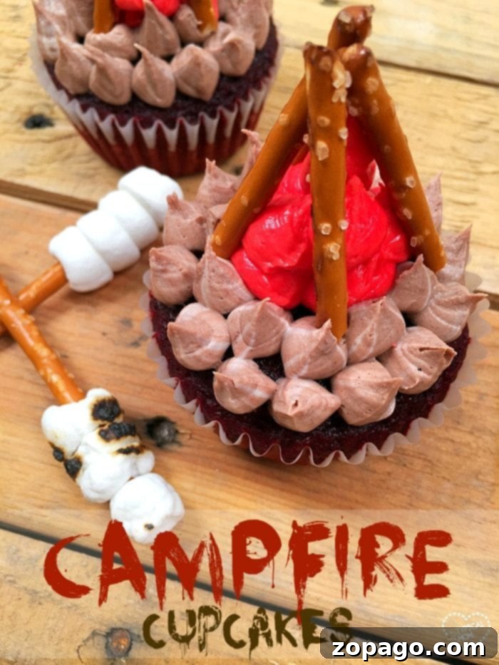Happy Camper Cupcakes 8 A festive spread of camping cupcakes, each meticulously decorated to resemble a tiny campfire, complete with pretzel logs and marshmallow-on-a-stick, creating a delightful dessert for any outdoor enthusiast.