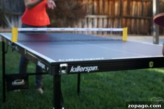 Killerspin Mini Ping Pong Table Review Performance and Portability 6 The Typical Mom reviews the Killerspin mini ping pong table, highly recommending it for family entertainment.