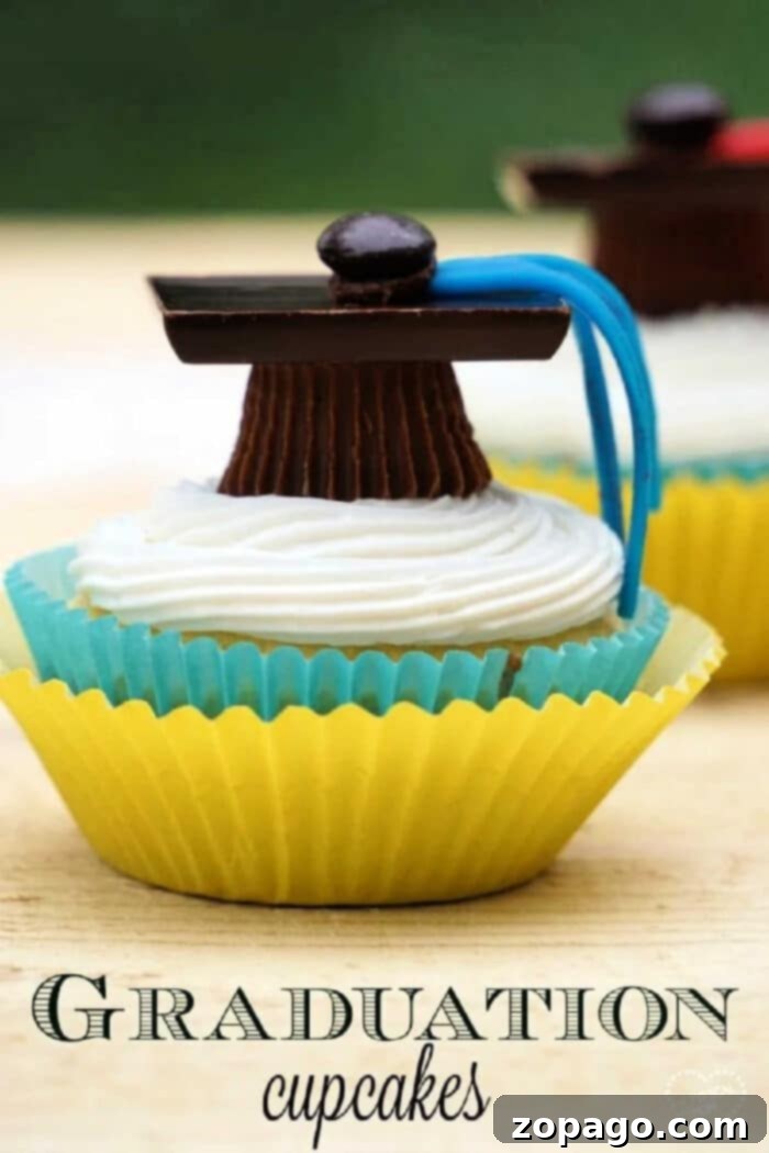 A beautifully arranged platter of graduation cap cupcakes with various school colors.