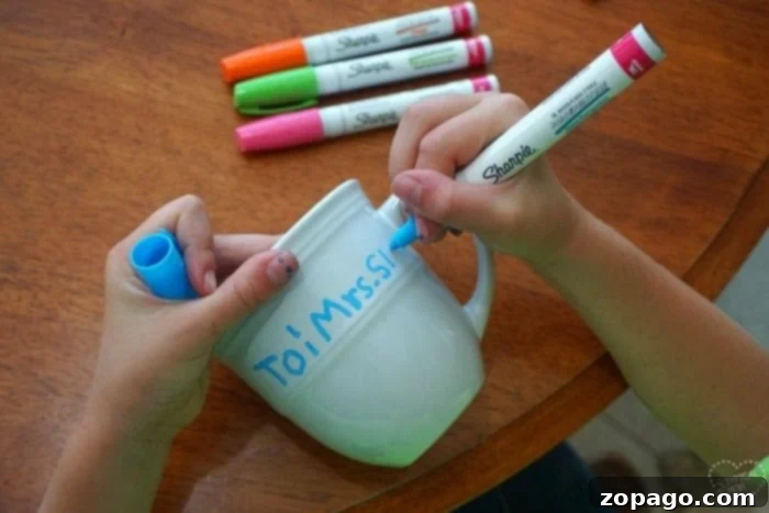 Create a Personalized Keepsake Plate 4 Detailed shot of Sharpie paint pen art on a ceramic plate, showcasing vibrant colors and intricate designs.