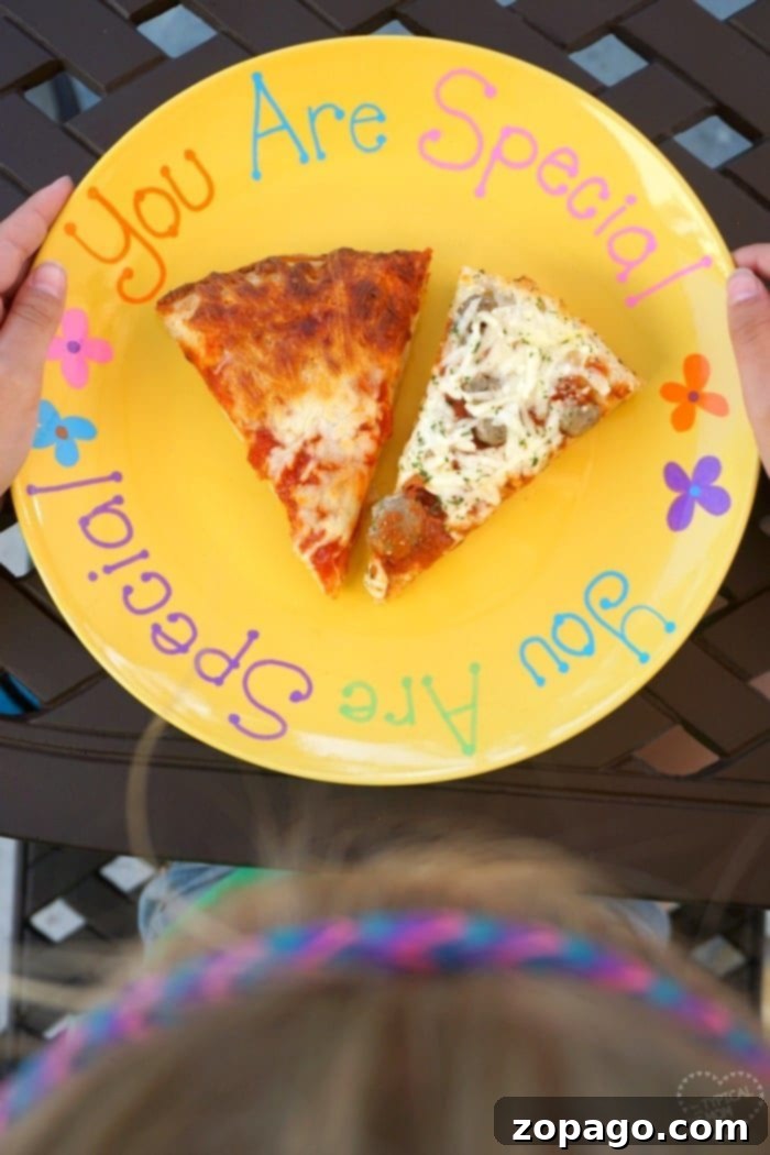 Create a 'You Are Special' Keepsake Plate 5 A beautifully decorated DIY 'You Are Special' plate, made with Sharpie paint pens, alongside a personalized mug, perfect for easy family crafts and gifts.