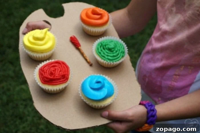 An art themed birthday party is perfect for boys and girls and inexpensive to put together! Here are a few fun party ideas including palette cupcakes, games, and art party favors that are perfect for artistic kids of all ages. #art #birthdayparty #party #activities #forkids #cheap #girl #boy Children happily engaged in painting activities at an art-themed birthday party, surrounded by colorful art supplies and decorations.