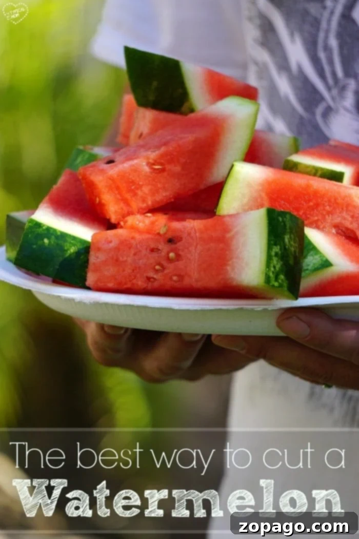 Master Watermelon Slicing with Ease 2 Perfectly cut watermelon sticks on a serving platter