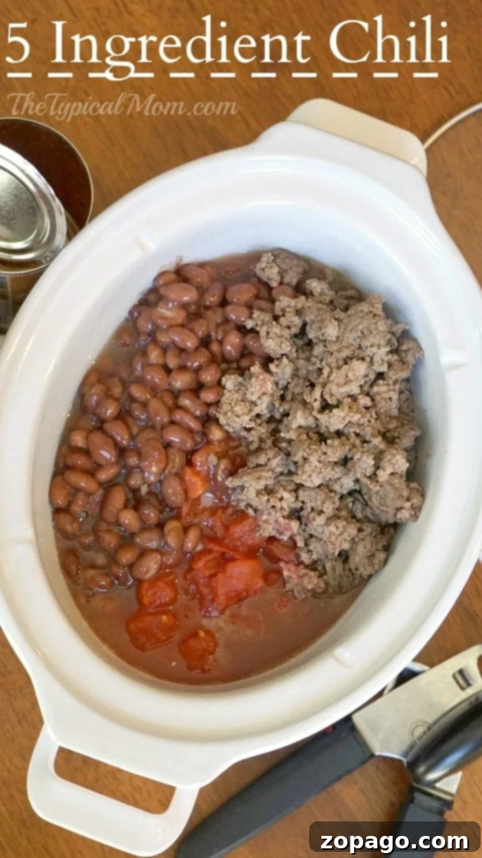 Crockpot chili with 5 ingredients! #crockpotchili #chili #crockpot #slowcooker Delicious 5 ingredient crockpot chili in a bowl with toppings.
